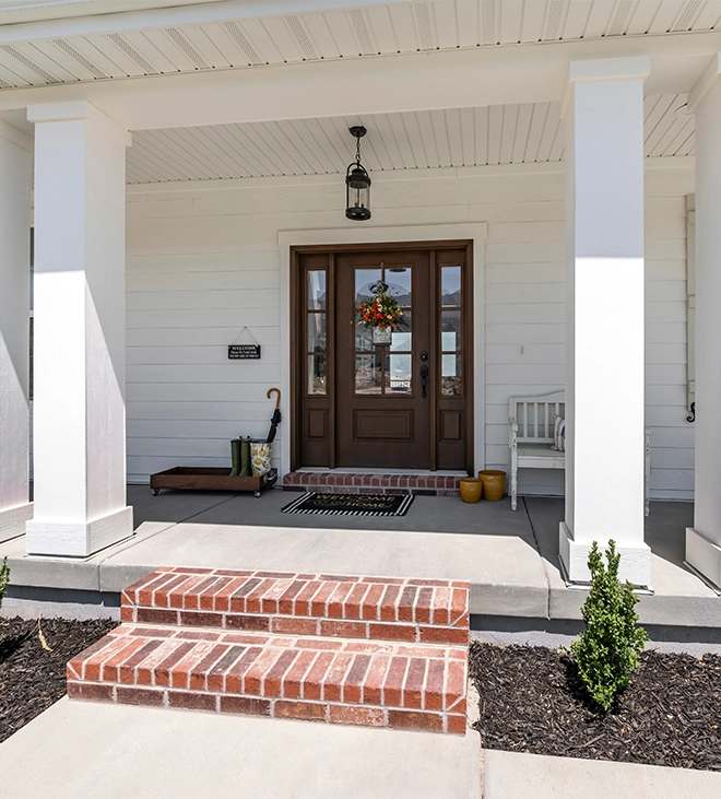 Front porch — Michael visits every home in person